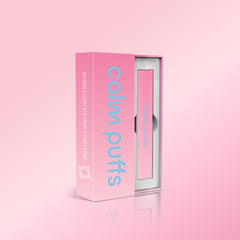 Calm Puffs Bubblegum Ice Pop + Caffeine diffuser in pink packaging displayed on a soft pink background, showcasing the vitamin-infused wellness puff