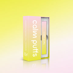 Calm Puffs Strawberry Banana Chill diffuser with Vitamin B12 in pastel yellow and pink packaging.