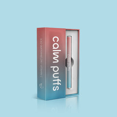 Calm Puffs Iced Watermelon Vitamin C diffuser in premium box on a light blue background.