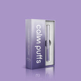 Calm Puffs Lavender Berry diffuser standing on purple background