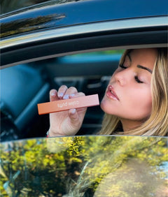 Women holding Calm Puffs Cotton Candy diffuser in car 