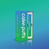 Calm Puffs Sour Apple Frost diffuser with Vitamin C in green and blue packaging on a gradient background